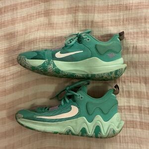 Nike women’s teal basketball/volleyball shoes